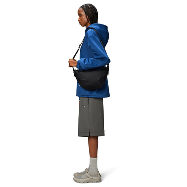 Rains Valera - Schultertasche 52 cm (black) - Markenkoffer